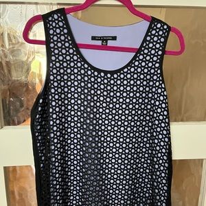 Women’s 3 sleeveless tops.